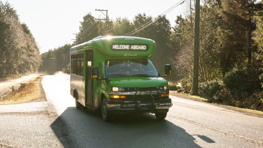 A BC Transit light duty bus at sunrise.