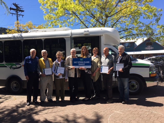 Transportation and Infrastructure Minister Claire Trevena, BC Transit Interim President and CEO Erinn Pinkerton, CRD Director Wayne McIntyre and some of the builders of the Salt Spring Island Transit System.