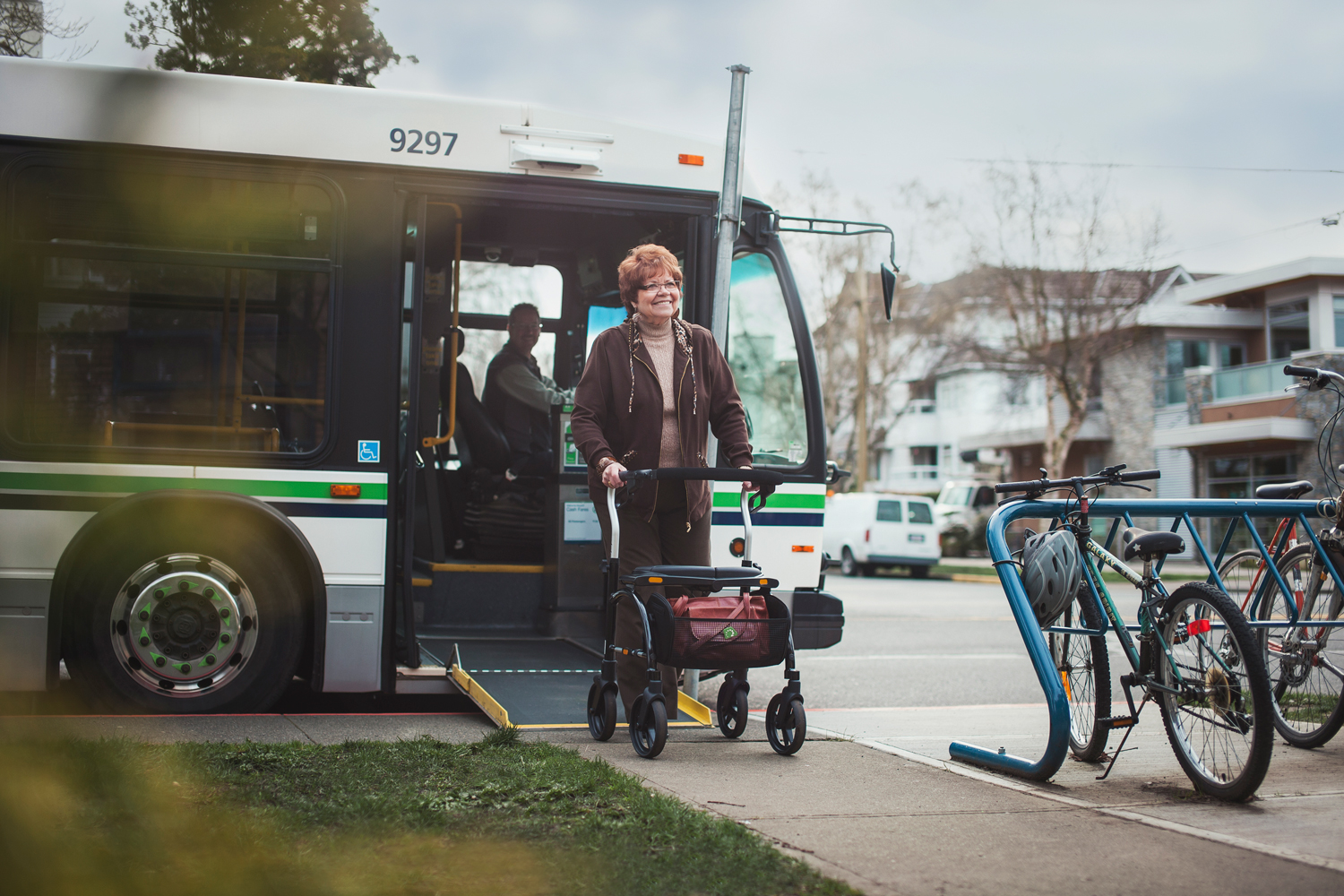 Woman with a walker leaving a Low-Floor and Lift-Equipped Bus